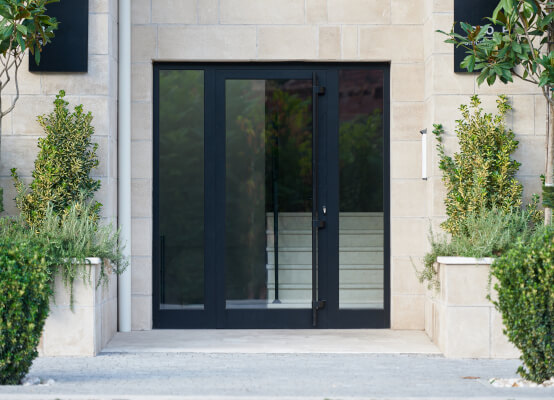 Clear glass front door with side panels