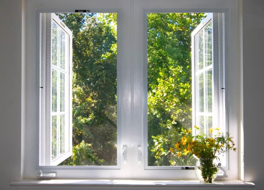 Double sash casement window with central mullion and glazing bars